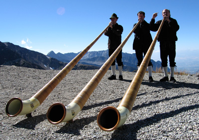 photo_snowbird_oktoberfest Alpenhorns, traditional horn instruments from the Alps, delight visitors to the Snowbird, Utah Oktoberfest.