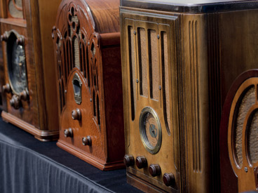Vintage radios on blue cloth