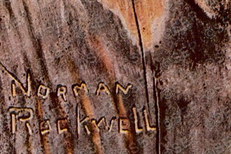 Rockwell's carved signature.