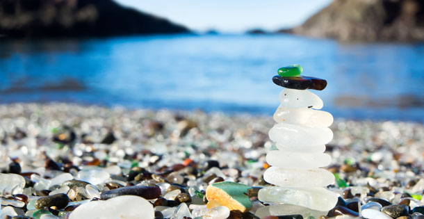 Pyramid of polished sea glass at Glass Beach in MacKerricher State Park, California.