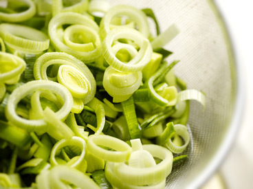 Washed and Sliced Leeks in Sieve