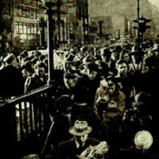 New York City citizens crowd the subway stairs.