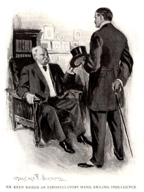 Men talking in a living room.