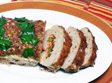 turkey meatloaf stuffed with broccoli, carrots, and bell peppers