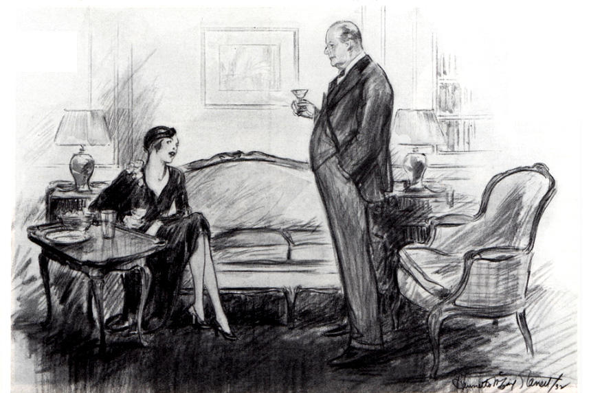 Man talking to a woman seated on a sofa